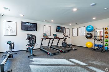 Fitness center with free weights and equipment